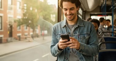 Language learner practicing on their phone during a commute, focused and engaged