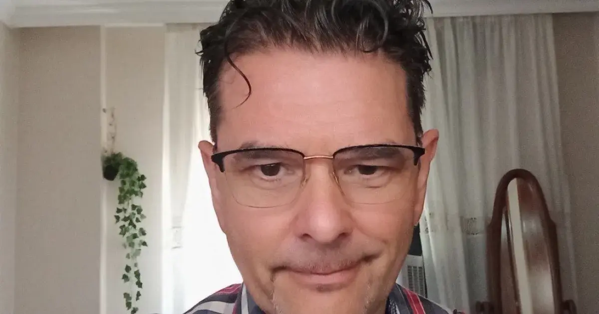 Alan Fisher, language teacher and Edumo community member, at work in his home studio